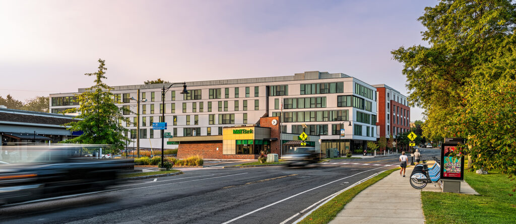 Street view of Eleven East Pleasant, a five-story multifamily building in Amherst, Massachusetts.