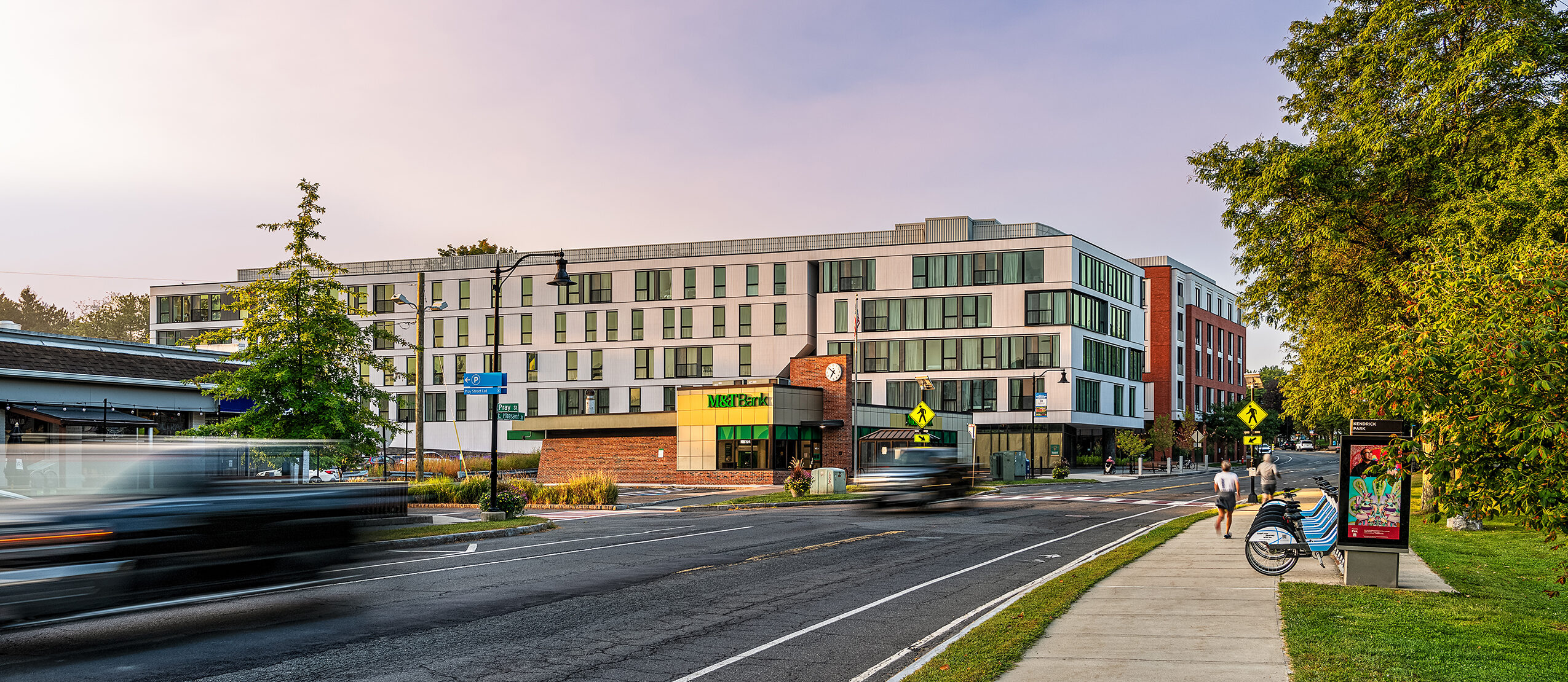 Street view of Eleven East Pleasant, a five-story multifamily building in Amherst, Massachusetts.
